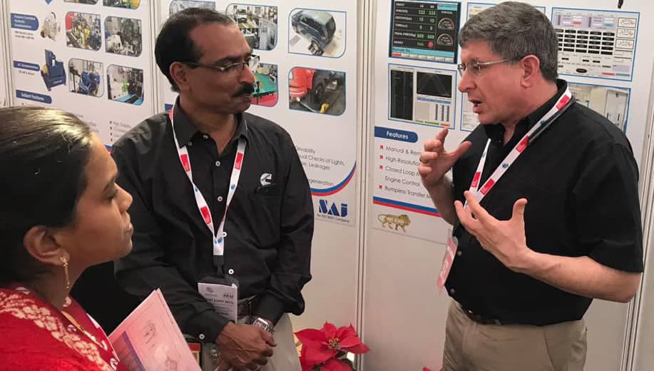 Dyno One staff member talking with customer